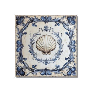 May include: A white seashell with a blue and white floral design around it. The design is on a square tile.