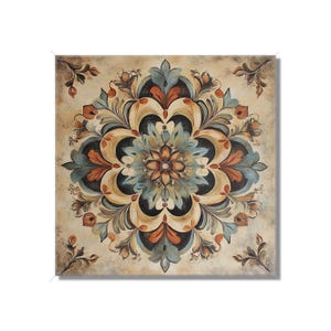 May include: A square canvas wall art featuring a large, intricate mandala design in shades of blue, brown, and cream. The mandala is made up of repeating floral patterns and swirls.
