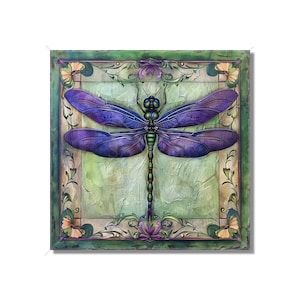May include: A purple and green dragonfly with intricate wings is framed in a decorative border with floral accents. The background is a textured green and brown.