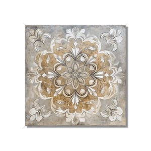 May include: Square wall art featuring a symmetrical floral design in shades of gray, beige, and white. The central motif is a detailed flower, surrounded by stylized leaves and flourishes, creating a textured, embossed effect.