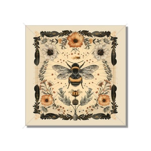 May include: A digital illustration of a bumblebee surrounded by a wreath of flowers in shades of orange, yellow, and white. The background is a light beige color.
