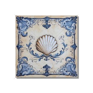 May include: A square ceramic tile with a blue and white floral design. The center of the tile features a large, raised, beige seashell.