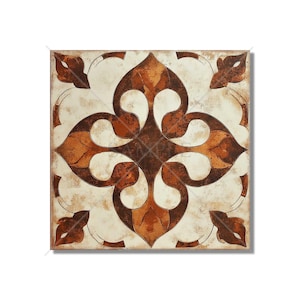 May include: A square ceramic tile with a brown and white geometric pattern. The pattern features a central motif of four overlapping, stylized leaves, creating a symmetrical design.