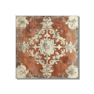 May include: Square wall art featuring a distressed, rust-colored background with a large, ornate white damask pattern in the center. The design includes floral accents in each corner, creating a vintage aesthetic.