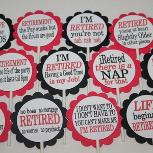 May include: A collection of retirement-themed cupcake toppers. Each topper features a scalloped edge in black or red, with white circles containing phrases like "Retired Life is Seven Day Weekends" and "I'm Retired, You're Not Nah Nah Nah."