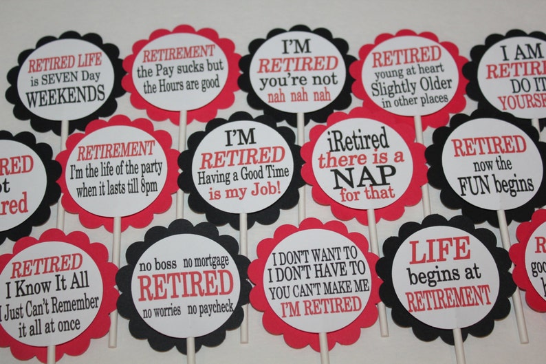 May include: A collection of retirement-themed cupcake toppers. Each topper features a scalloped edge in black or red, with white circles containing phrases like "Retired Life is Seven Day Weekends" and "I'm Retired, You're Not Nah Nah Nah."