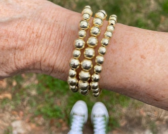 Gold brushed beaded stretch bracelet