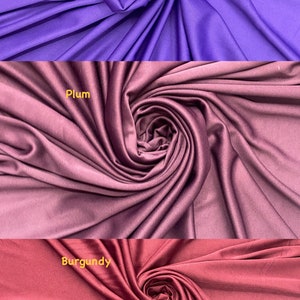 May include: Three fabric swatches in different shades of purple. The top swatch is a bright purple, labeled "Purple". The middle swatch is a deep purple, labeled "Plum". The bottom swatch is a dark red, labeled "Burgundy".