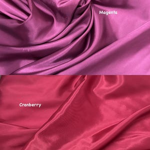 Puede incluir: Dos muestras de tela, una magenta y otra ar&aacute;ndano. La tela magenta est&aacute; en la parte superior, con la palabra "Magenta" impresa. La tela de ar&aacute;ndanos est&aacute; en la parte inferior, con la palabra "Cranberry" impresa. Ambas telas tienen un aspecto brillante, similar al sat&eacute;n.