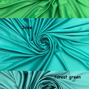 May include: Three swatches of fabric in different shades of green. The top swatch is Kelly green, the middle swatch is Jade, and the bottom swatch is Forest green.