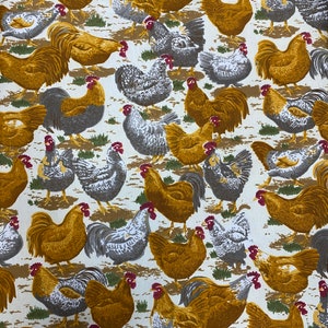 May include: A white fabric with a repeating pattern of brown and gray chickens. The chickens are in various poses, some are standing, some are walking, and some are pecking at the ground.