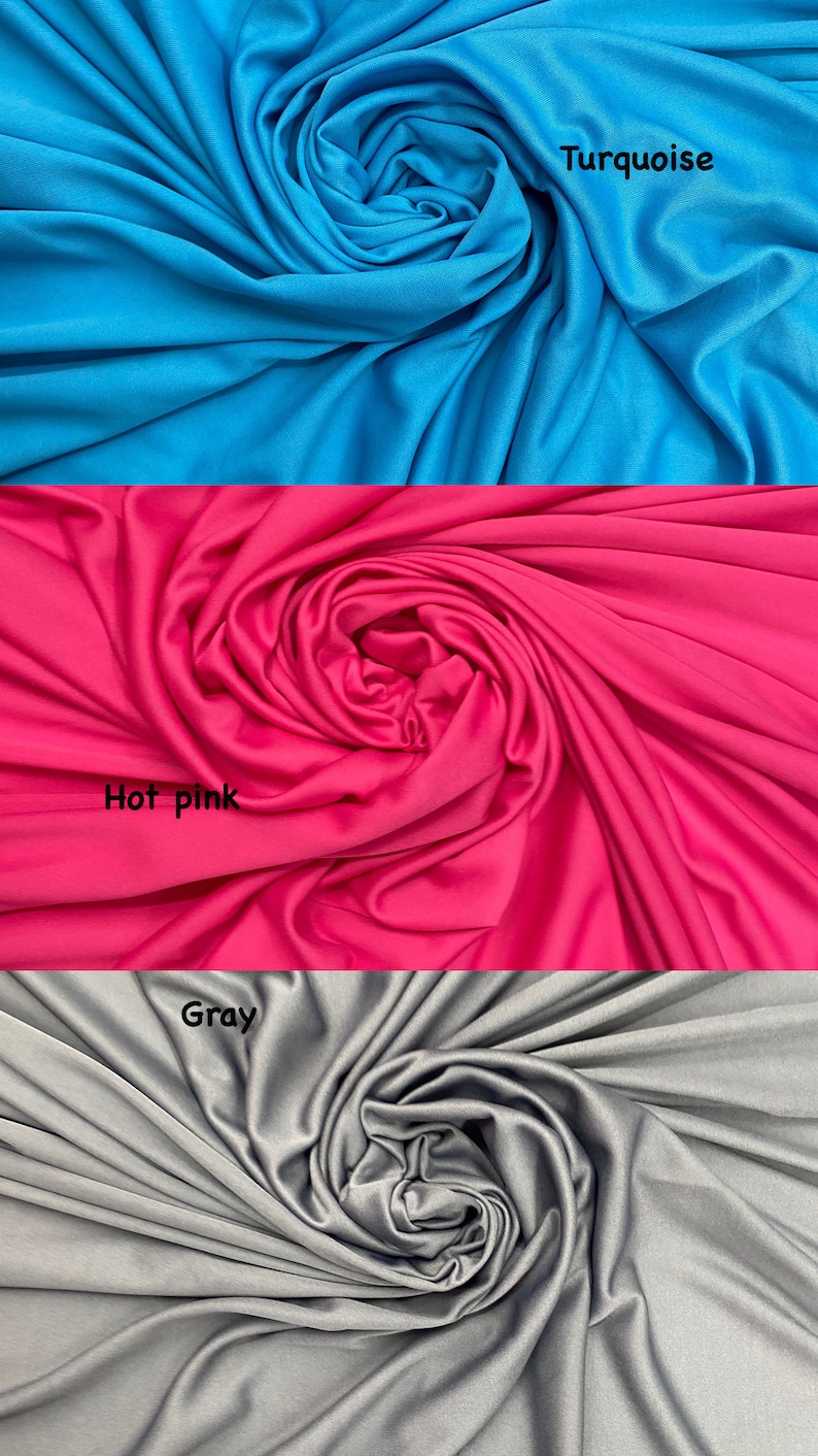 May include: Three fabric swatches in turquoise, hot pink, and gray. The fabric is smooth and has a slight sheen.
