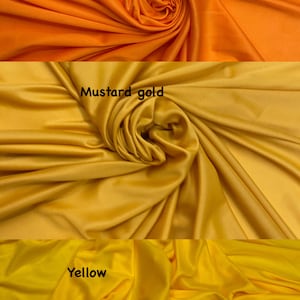 May include: Three fabric swatches in different shades of yellow. The top swatch is orange, the middle swatch is mustard gold, and the bottom swatch is yellow.