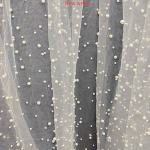 Scattered  Pearls Studded Mesh, 2-Way Stretch, Price is for a full yard.