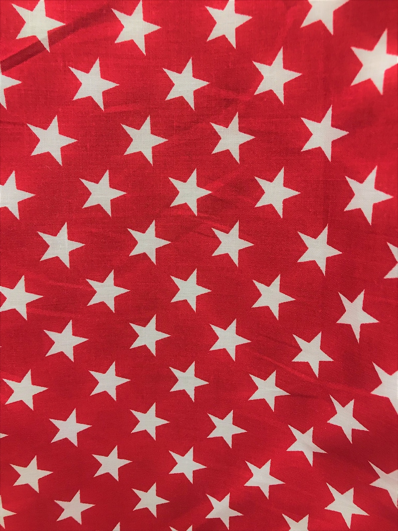 May include: Red fabric with a white star pattern. The stars are evenly spaced and arranged in a diagonal pattern.