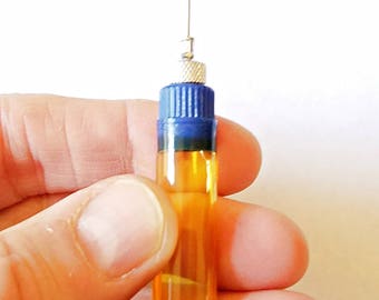 Ultra Pure, 100% synthetic CLOCK OIL in precision needle oiler.