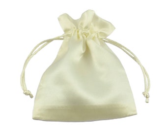 May include: A small, ivory-colored satin drawstring bag with a gathered top. The bag is empty and has a smooth, silky texture.