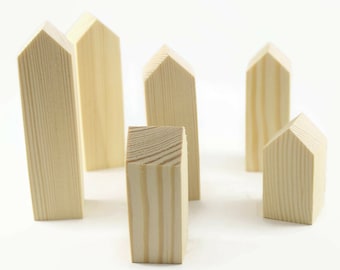 Wooden houses. Different sizes. wooden craft supplies. unfinished houses for painting. houses for table settings