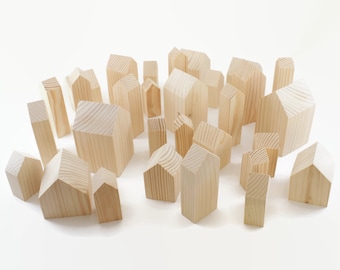 Wooden houses. Different sizes. wooden craft supplies. unfinished houses for painting. houses for table settings