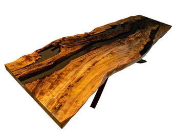 Live edge dining table with grey resin made of guawa exotic wood