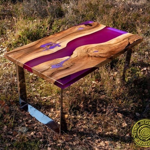Deep purple resin coffee table with glowing resin