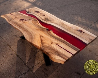 Red resin coffee table with x spider style legs