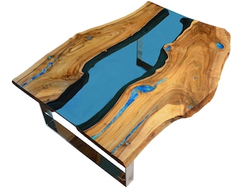 Live edge river coffee table with glowing resin fillin and natural turquoise stone