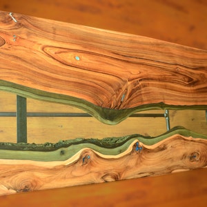 Live edge river table with glowing resin fillin