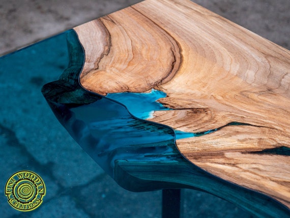 Wood table with river glass deals