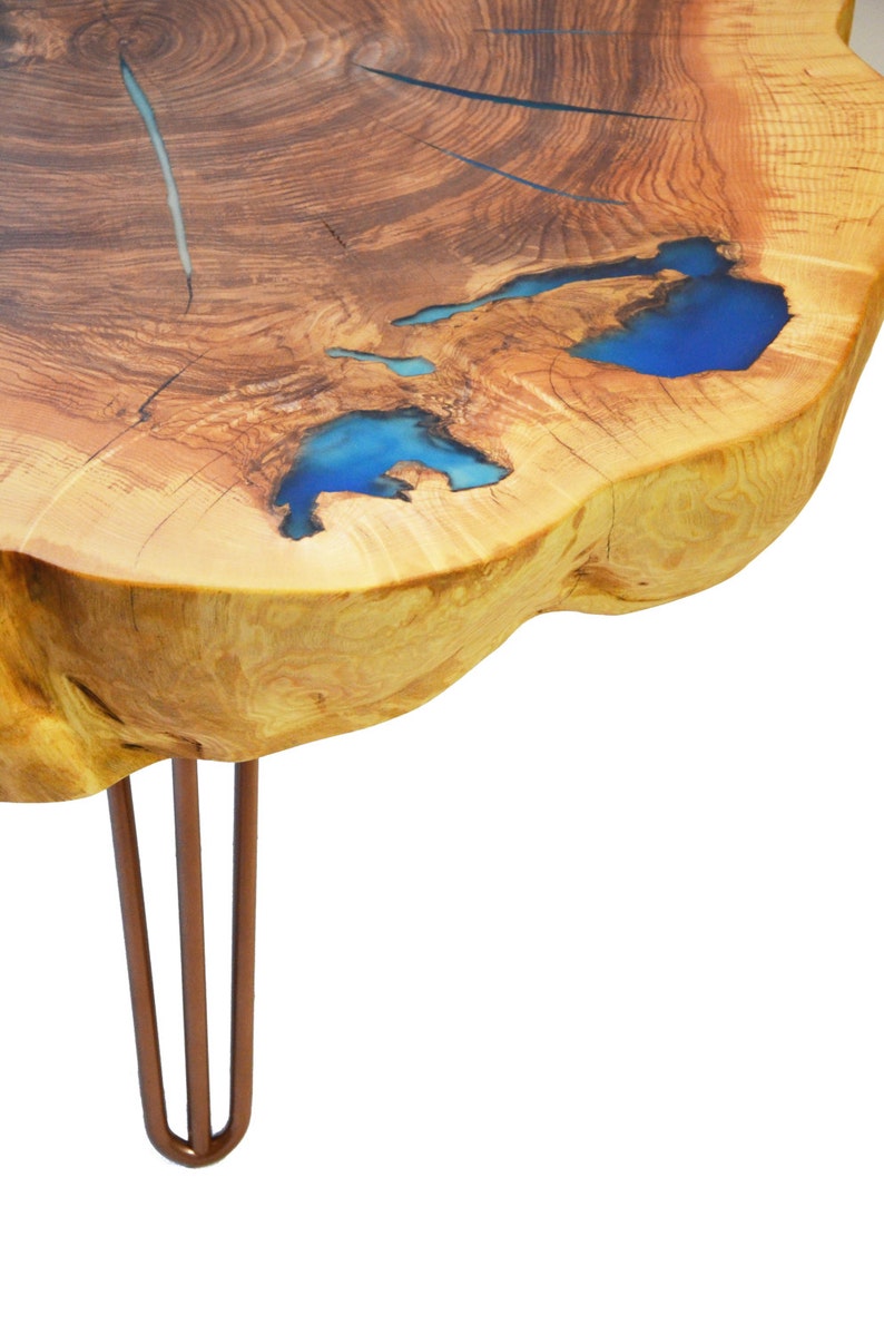 Round live edge coffee table with glowing resin fillin ...