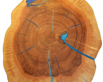 Round live edge coffee table with glowing resin fillin/hairpin cooper legs