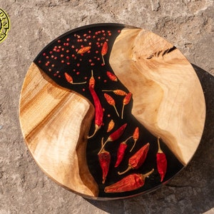 Round spicy serving board with pepper and paprika on black resin Burl wood / cheese board, housewarming Gift, charcuterie, Wedding Gift