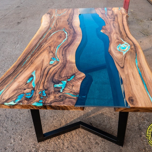 Live edge river dining table with turquoise glowing resin, walnut wood, blue transparent glass river