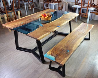 Live edge river dining table with bench and glowing resin fill in