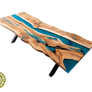 Live edge resin river dining table with turquoise glowing resin, walnut wood