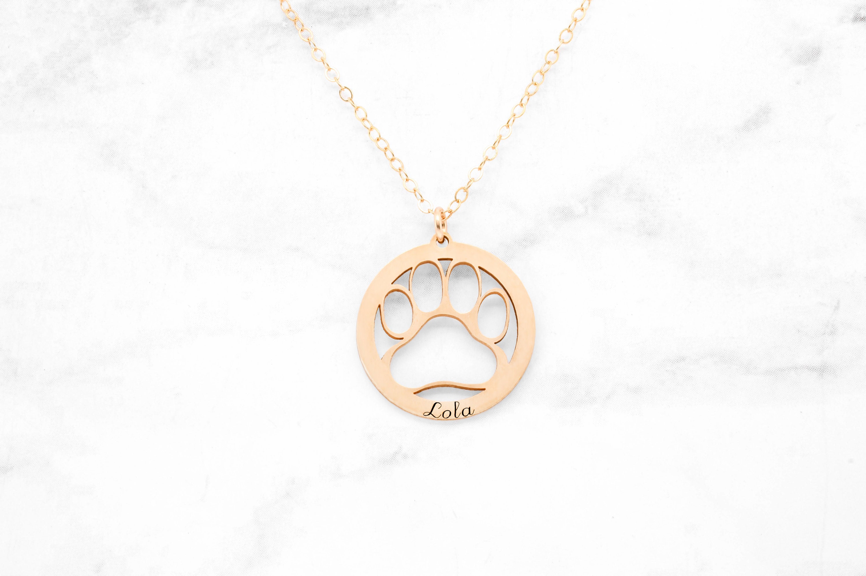 Paw print hotsell jewelry gold