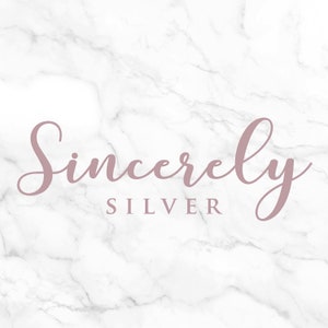 May include: A white marble background with the text "Sincerely SILVER" in a pink cursive font.