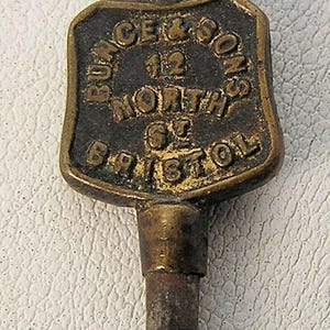 Reloj de bolsillo con cartel publicitario de Inglaterra antigua, llave de cuerda, Bunce & Sons Bristol 32