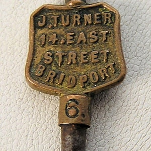 Reloj de bolsillo con cartel publicitario de la antigua Inglaterra, llave de cuerda Jay Turner Bridport 35