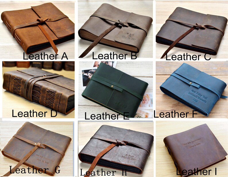 May include: Nine different leather-bound photo albums with various colors and styles. Each album has a leather strap and a personalized inscription.