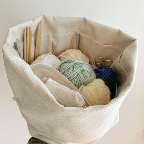 Medium knitting bag.  Natural organic canvas organizer/project bag, numerous pockets hold all your supplies. Portable & eco-friendly