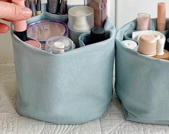 Bathroom organizer and portable storage bin in one! For makeup/cosmetics/toiletries. Organic canvas and one of a kind!