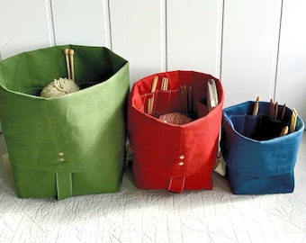 Organic knitting bag and organizer with numerous pockets to hold all your supplies. Portable, eco-friendly gift for knitters/crocheters.