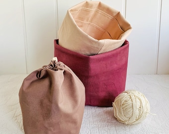 Yarn and needle bag/knitting organizers with numerous pockets to hold all your supplies. Portable & eco-friendly organic canvas. 3 sizes.