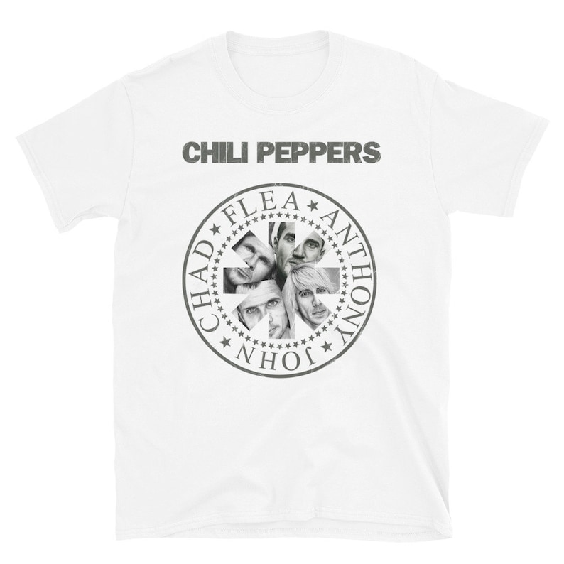 May include: White t-shirt with a black and white graphic of the band Chili Peppers. The graphic features a circle with the band members' names around the edge and their faces in the center.