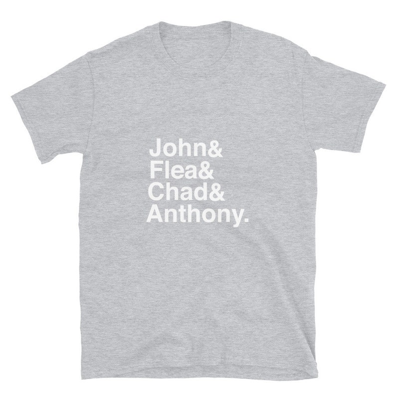 May include: A heather gray t-shirt with white text that reads "John & Flea & Chad & Anthony."