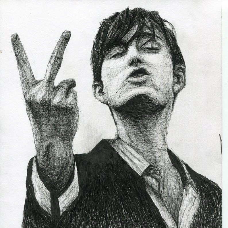 May include: A black and white drawing of a person making a peace sign with their hand. The person is wearing a suit jacket and has short, dark hair.