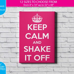 May include: A pink canvas print with white text that reads "Keep Calm and Shake It Off". The print features a crown at the top and is available in 12 sizes, from 8 inches by 10 inches to 32 inches by 48 inches.
