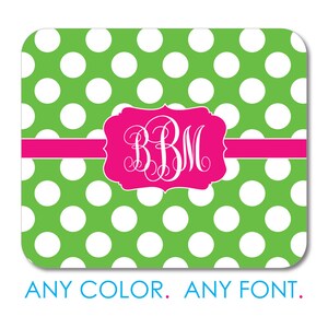 May include: Green and white polka dot mouse pad with a pink monogram that says "BBM".