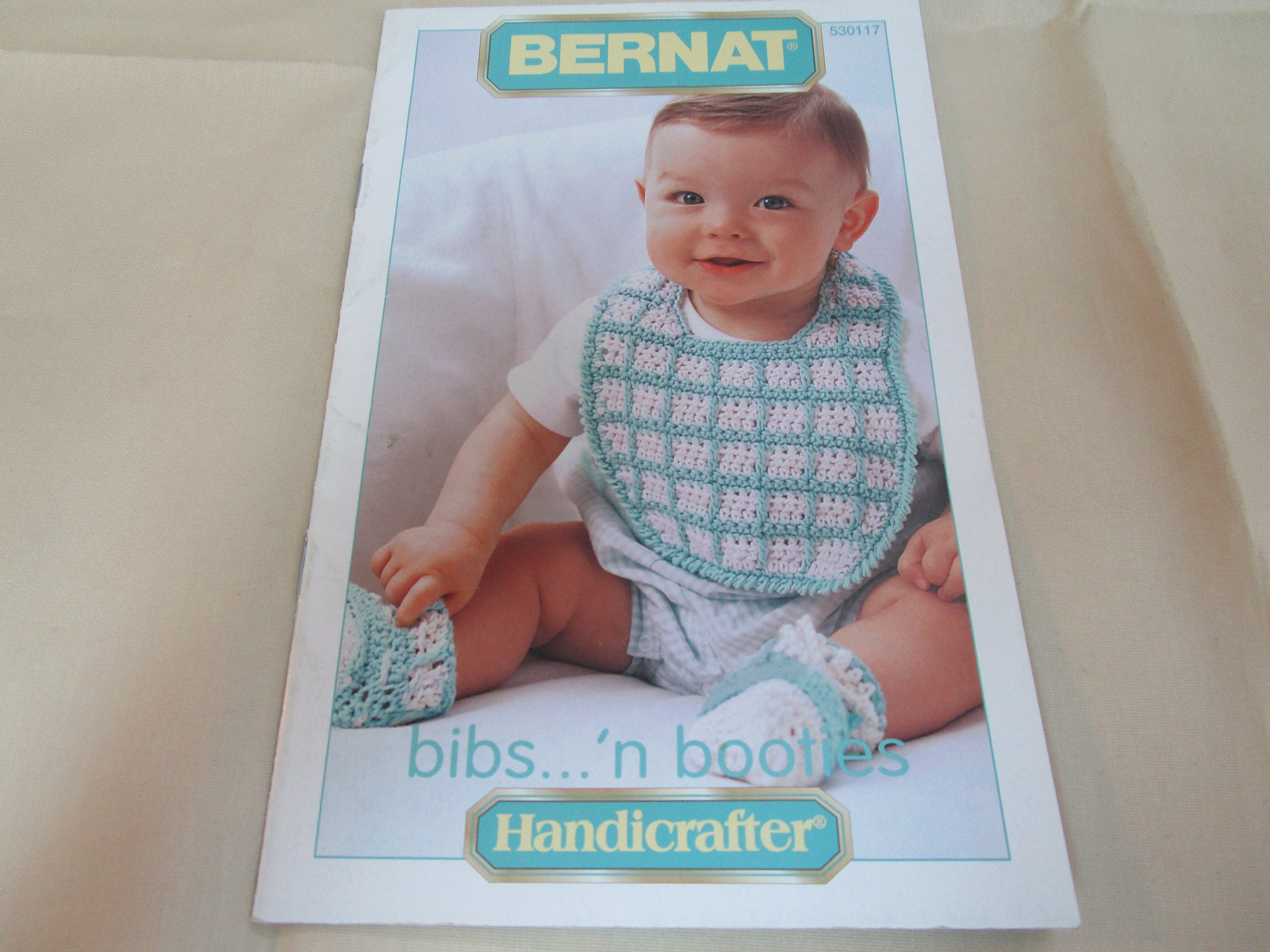 Baby Bibs and Booties Crochet Patterns Bernat 530117 2003 4